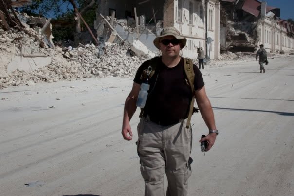 James on a damaged street in Haiti after the 2010 earthquake